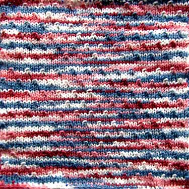 Knitted square for Afghan sampler - Elm Seeds pattern